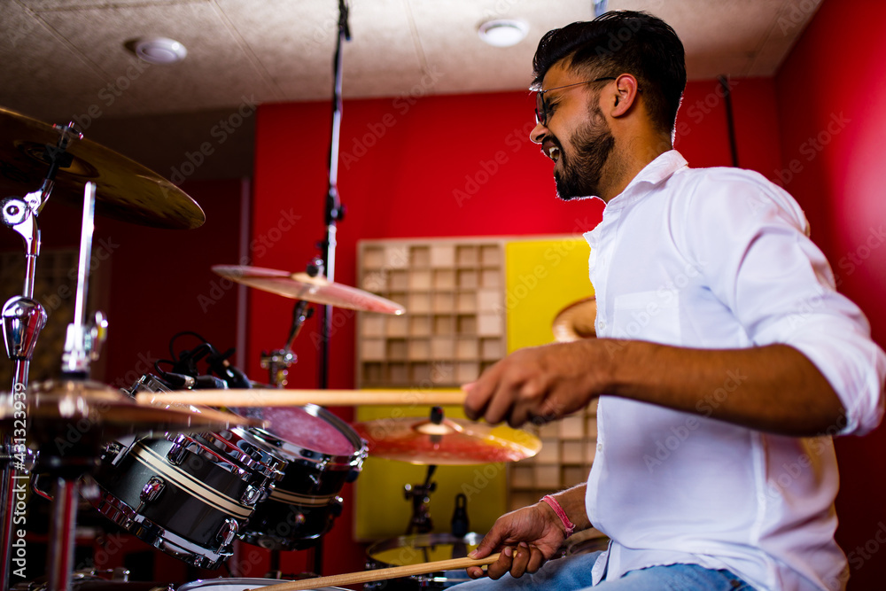 Young arabic man in a professional recording studio Young arabic man in a professional recording studio