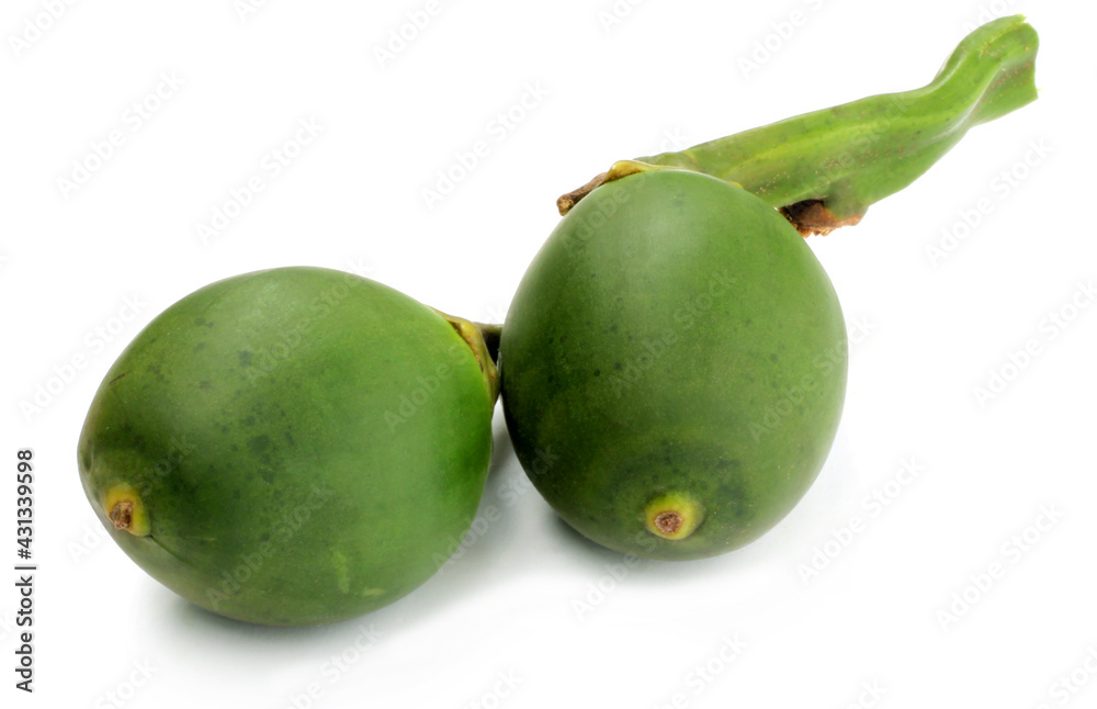 Green betel nuts over white background Green betel nuts over white background