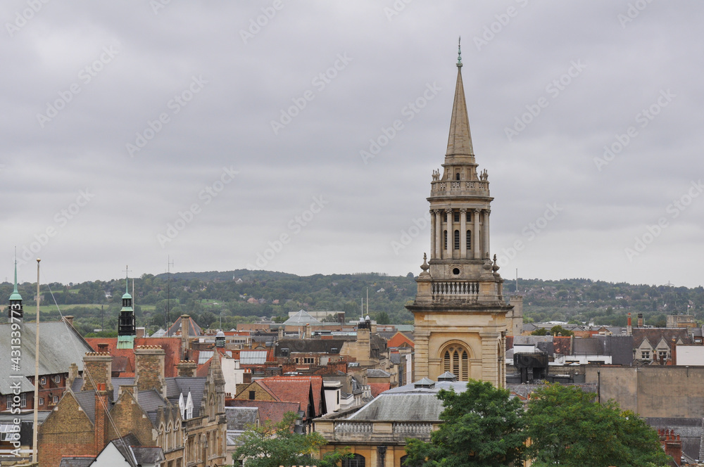 Rooftop view towards All Saints Church on an overcast day, Oxford, United Kingdom. Rooftop view towards All Saints Church on an overcast day, Oxford, United Kingdom.
