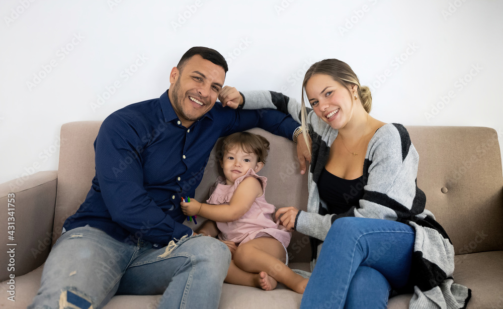 parents playing with their daughter on the sofa at home very happy and fun
parents playing with their daughter on the sofa at home very happy and fun