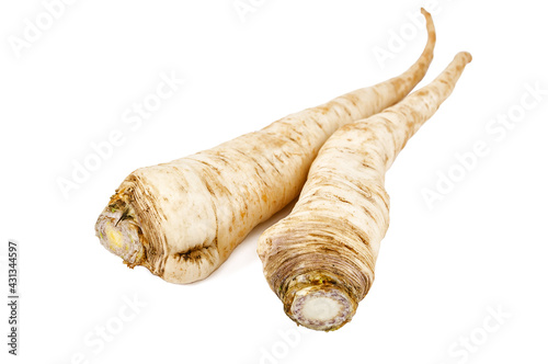 two parsley roots on white