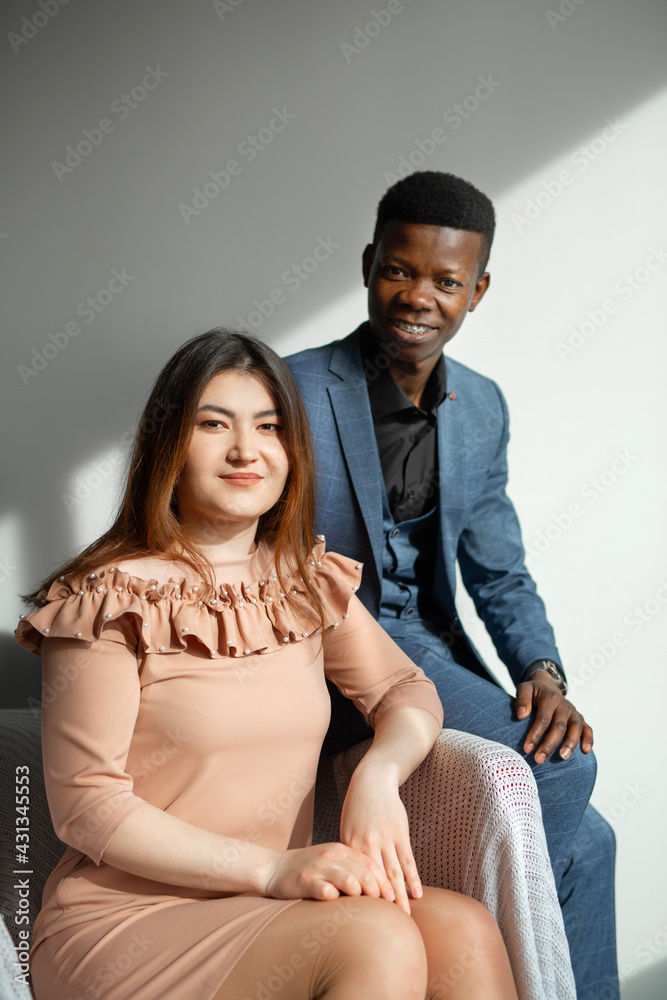 portrait of young people, african man and caucasian woman portrait of young people, african man and caucasian woman