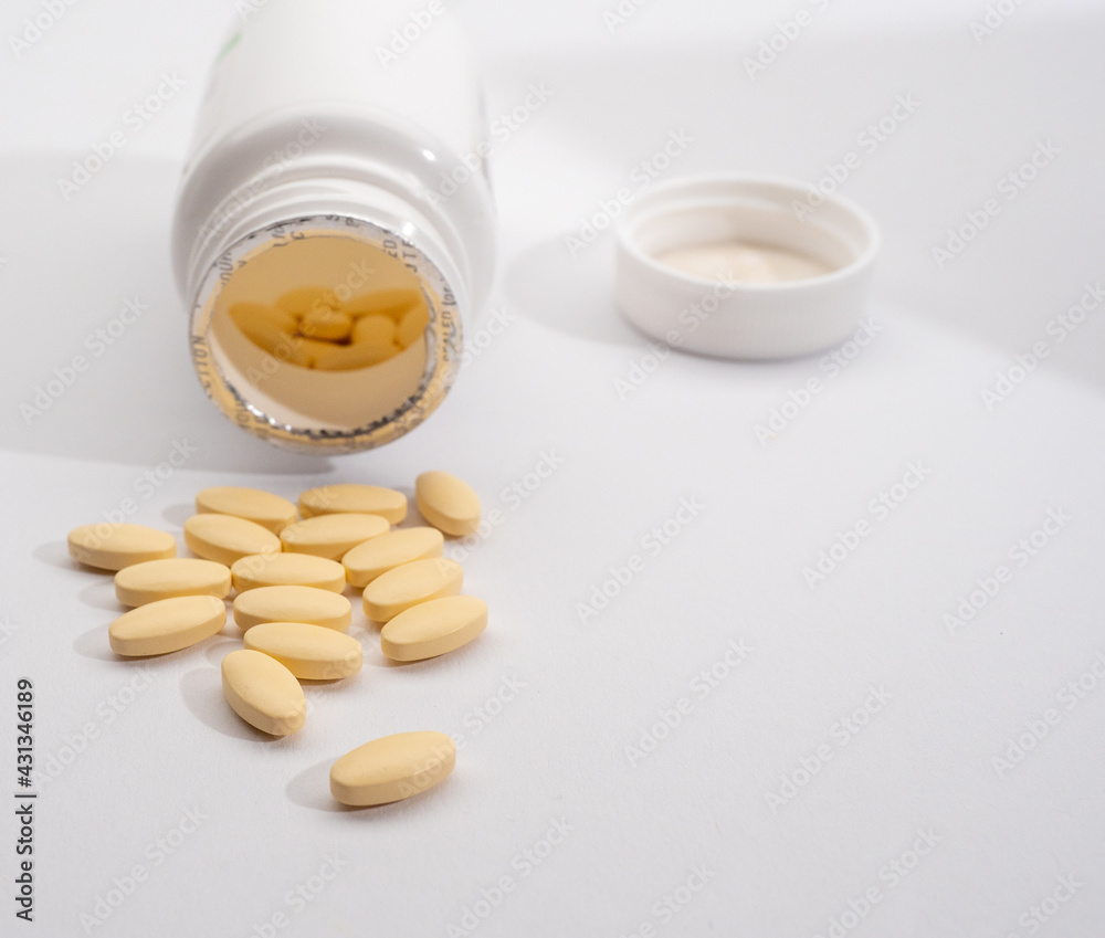 jar of pills on a white background