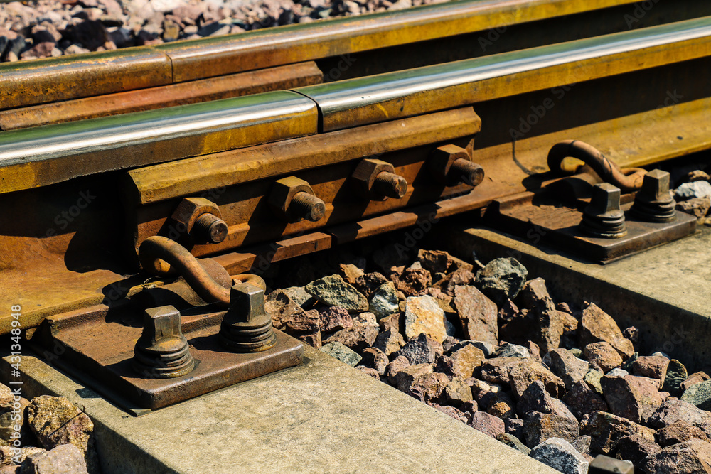 Close up Rail fastener for hole rail with concrete plinth track of sky train Close up Rail fastener for hole rail with concrete plinth track of sky train