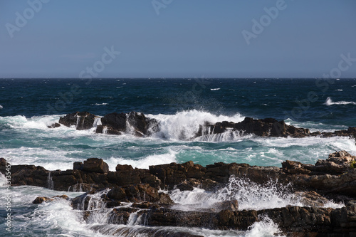 waves crashing on rocks © Louis