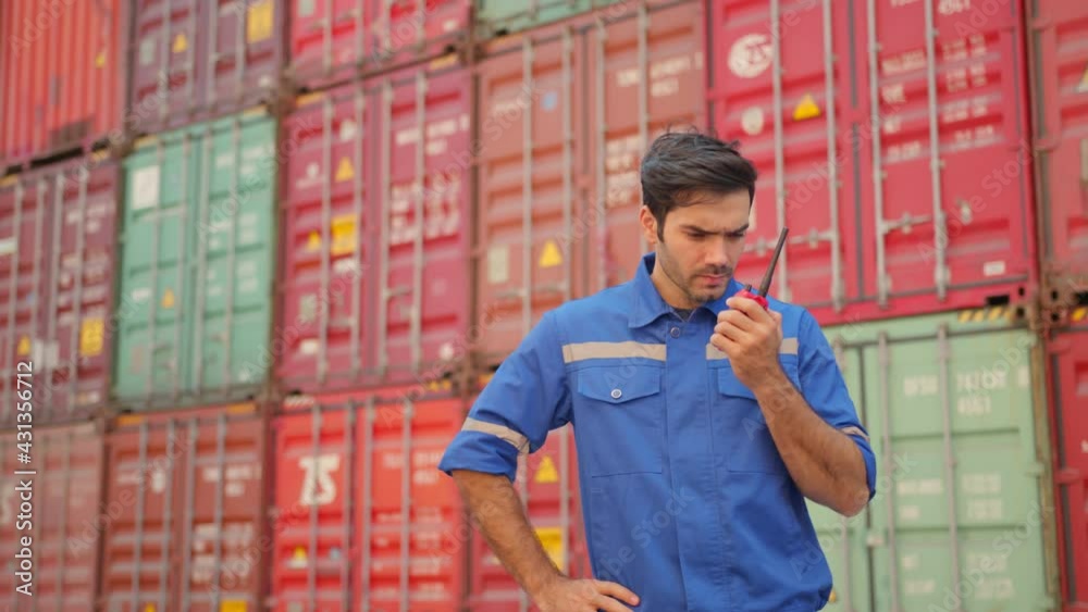 portrait Senior cargo manager hand hold radio control working process