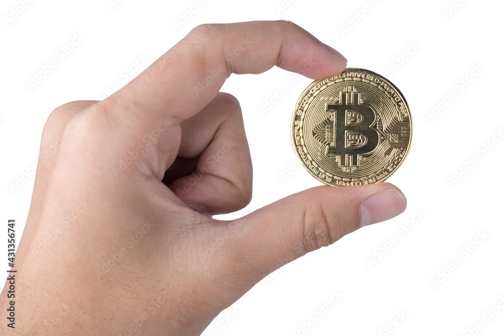 Isolated of human hand grab a golden coin with bitcoin symbol on white background with clipping path Isolated of human hand grab a golden coin with bitcoin symbol on white background with clipping path