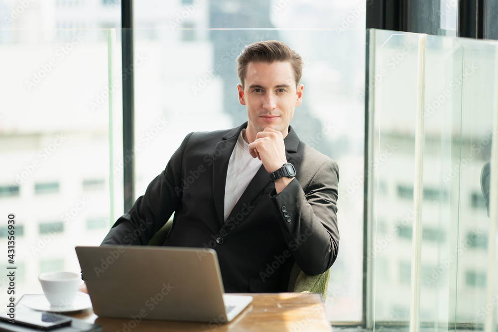 Confident business Man with smartphones in airline lounges Confident business Man with smartphones in airline lounges