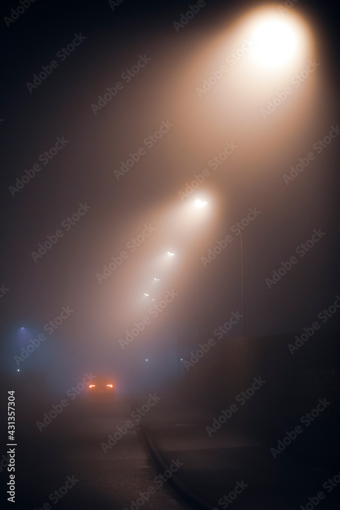 Car in the fog