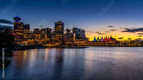 Blue Hour after the Sun has set over the Harbor and the Colorful Sails of Canada Place, the Cruise Ship Terminal and Convention Center on the Waterfront of Vancouver, British Columbia, Canada