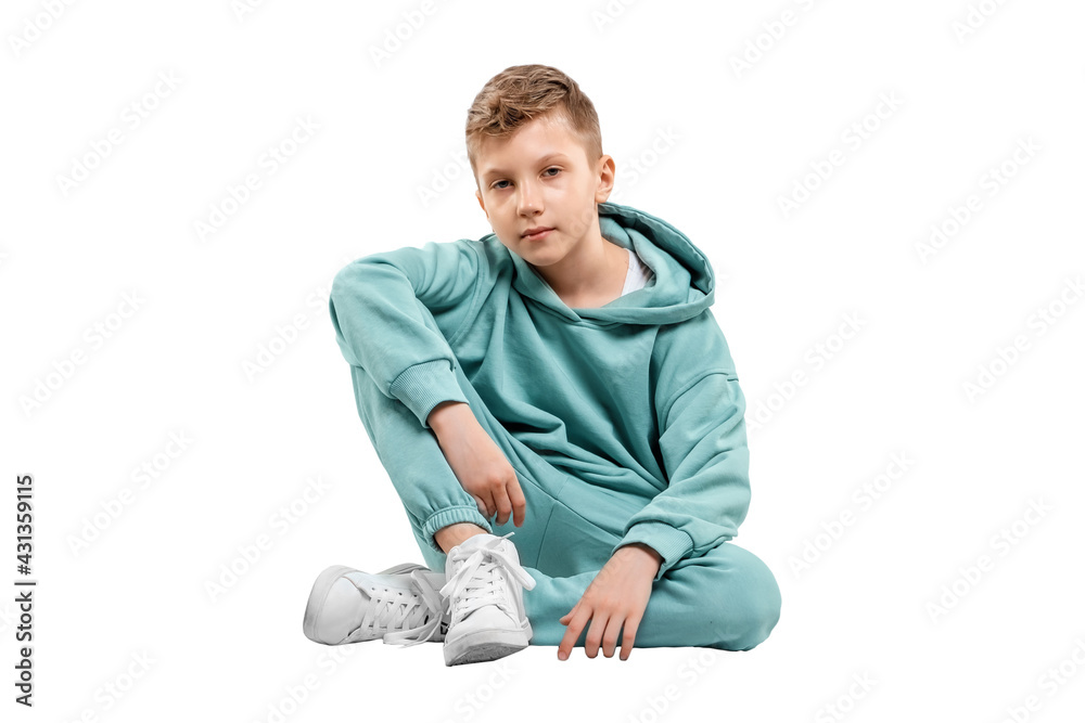 Handsome boy in blue suit isolated on white background. Studio portrait of a child. Handsome boy in blue suit isolated on white background. Studio portrait of a child.