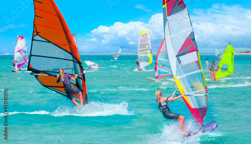 Bild auf Leinwand Windsurfer surfing the wind on waves in Cesme bay - Izmir, Turkey