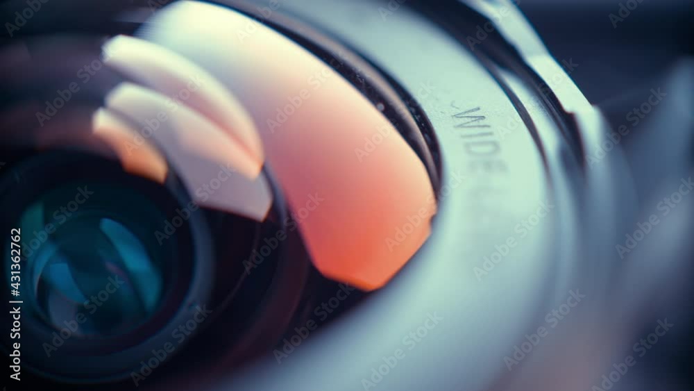 the lens of a movie camera or photo camera is shot in close-up