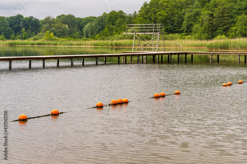 Bathing jetty and jumptower at the Passower See (Lake Passow), Mecklenburg-Western Pomerania, Germany photo