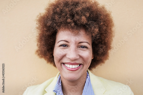 Portrait of mature african woman smiling in camera photo