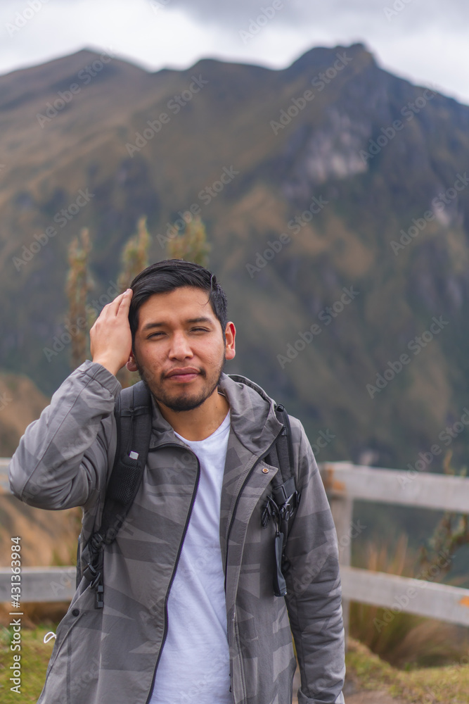 Young man enjoying the outdoors in the mountains. Young man enjoying the outdoors in the mountains.