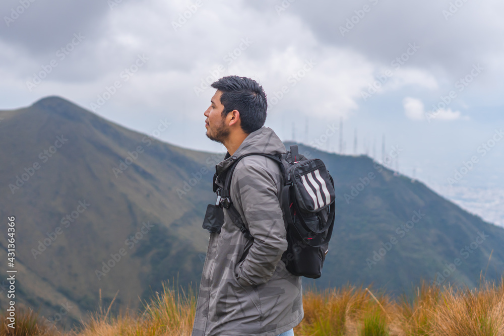Young man enjoying the outdoors in the mountains.