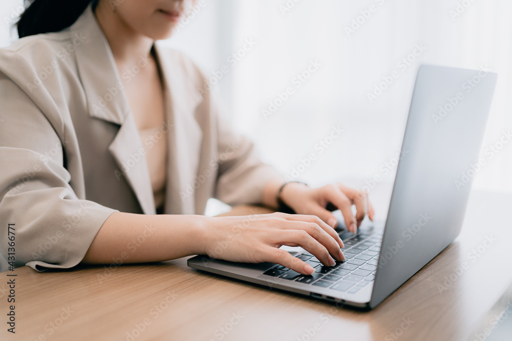 Smart asian working businesswoman typing keyboard for browsing internet and sending email with computer laptop, selective focus on female hand, Woman employee operator worker business job concept Smart asian working businesswoman typing keyboard for browsing internet and sending email with computer laptop, selective focus on female hand, Woman employee operator worker business job concept