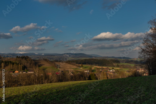 View for Roprachtice village with old church in spring nice sunny evening photo