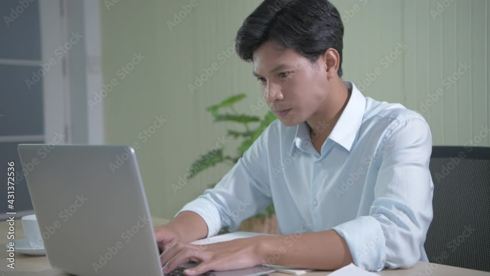 Business concept of 4k Resolution. Asian men are working with a rush in the office. Business concept of 4k Resolution. Asian men are working with a rush in the office.