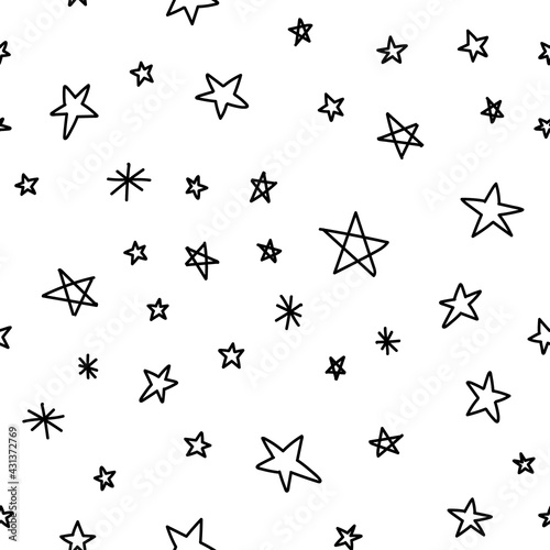 Hand drawn stars seamless pattern. Monochrome texture background of star doodle illustrations.