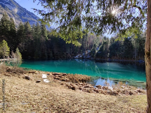 Blausee is a small lake, in Switzerland, in the Kander valley, known for the amazing blue colour of its water