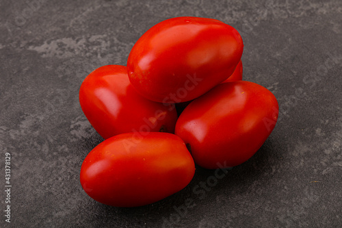 Red bright tasty tomato heap