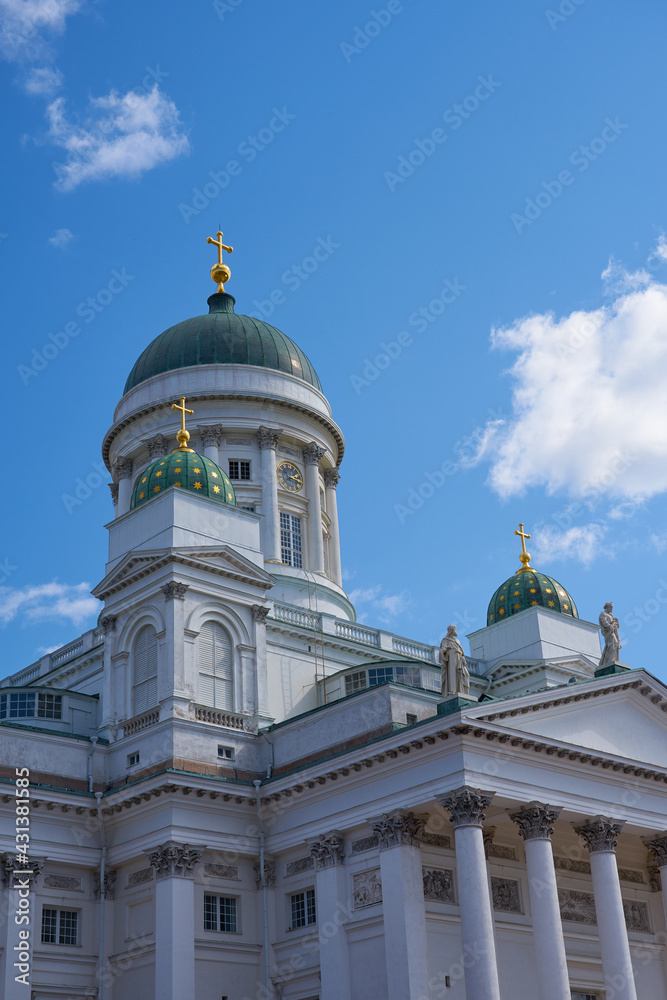 The towers of the cathedral in Helsinki against the blue sky.