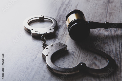 Photos Legal law concept image - gavel and handcuffs
