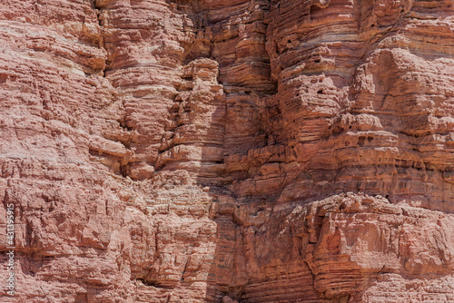 An amazing place in Israel is called the Red canyon and Nahal Shani, Southern District. Totally worth visiting because of its stunning stony structure. High quality photo