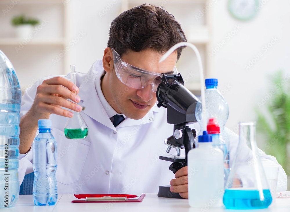Lab assistant testing water quality Lab assistant testing water quality