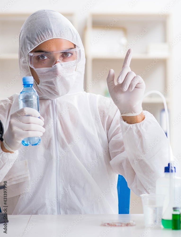 Lab assistant testing water quality