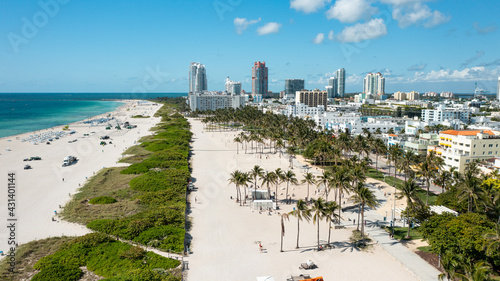 aerial drone view of South Beach and Ocean Drive in Miami Beach, in a sunny day of May 2021 © Cristian