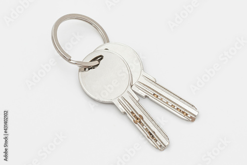 Close up of keys on white background.