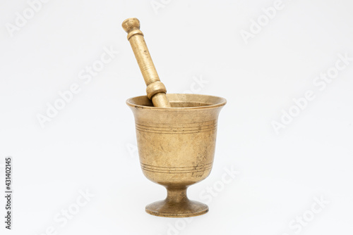 Konstfotografi Antique and mged pestle and mortar on the white background.