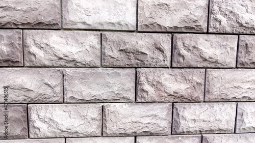 Gray brick wall. New and beautiful