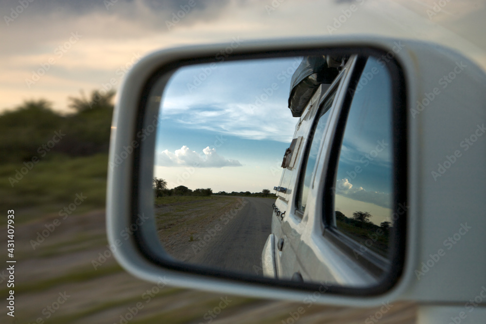 Mirror and african view while driving in Nambia - Kaokoland