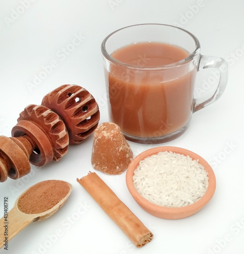 cocoa drink, Chilate, brown sugar, rice, cocoa, cinnamon, Mexican chocolate whisk called 