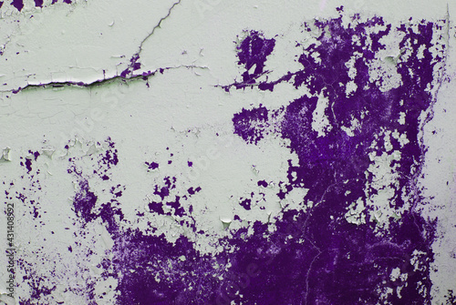 Rustic wall with violet paint