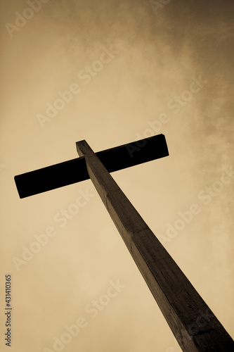 Jesus old cross with sky in the background. Antique style image.