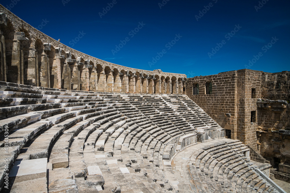 Aspendos Amphitheater close-up inside in the summertime with sunshine, Turkey, Serik.