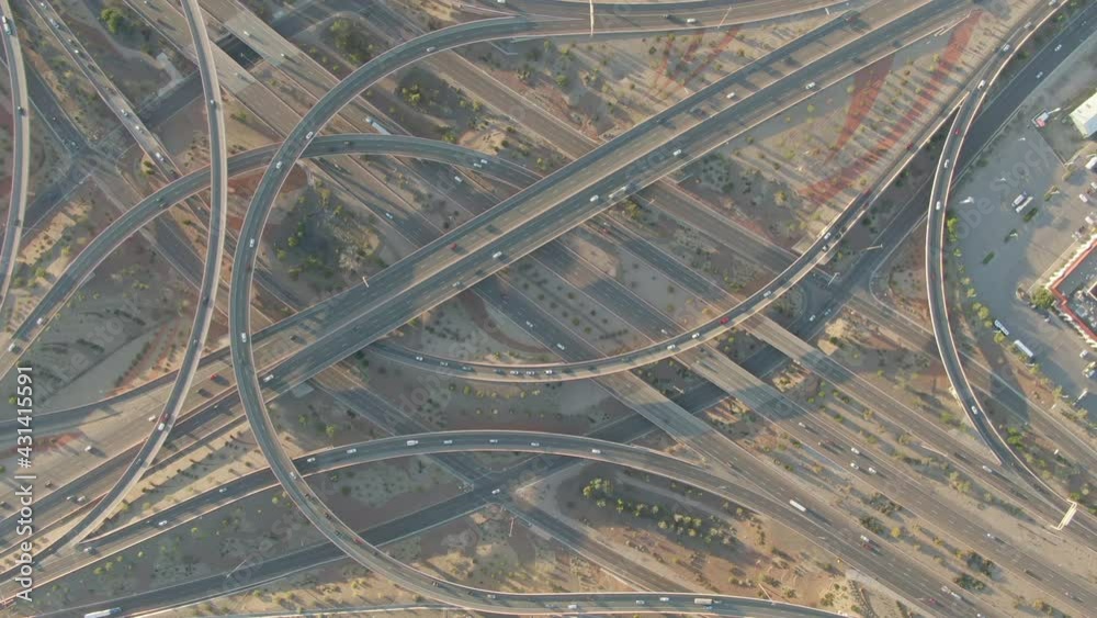 Aerial Lockdown Shot Of Vehicles On Bridges In City At Sunset, Drone Flying Over Cars - Albuquerque, New Mexico Aerial Lockdown Shot Of Vehicles On Bridges In City At Sunset, Drone Flying Over Cars - Albuquerque, New Mexico