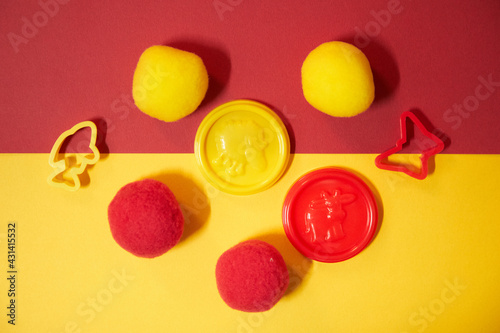yellow and red caps with play toys