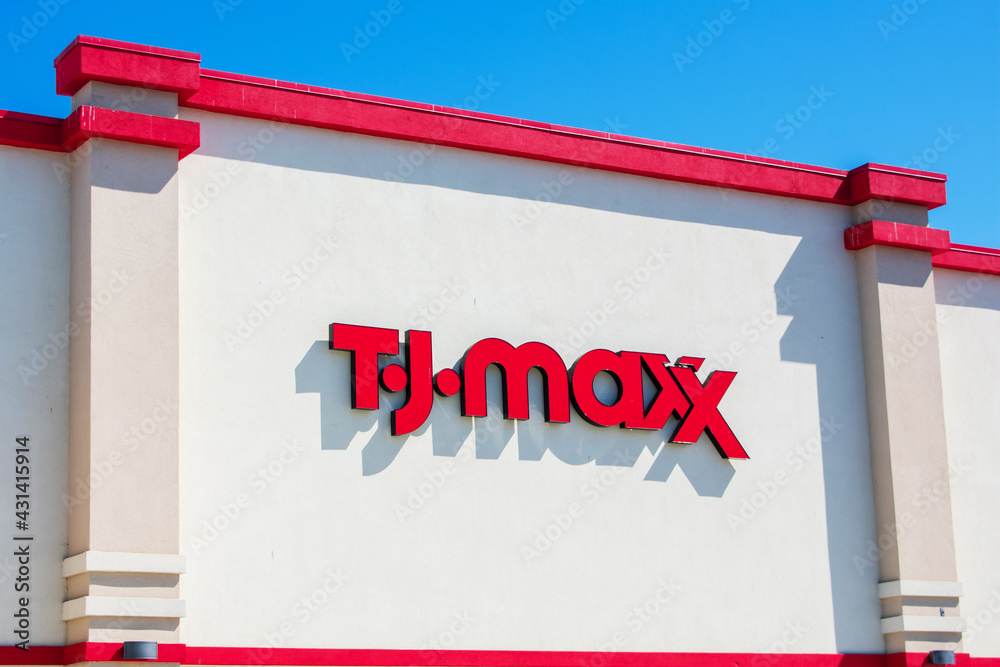 TJ Maxx sign on the retail department store of TJX Companies location. -  San Jose California, USA - 2021 Stock Photo