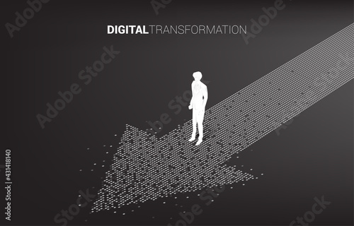 Silhouette of businessman standing on the arrow from pixel. concept of digital transformation of business.