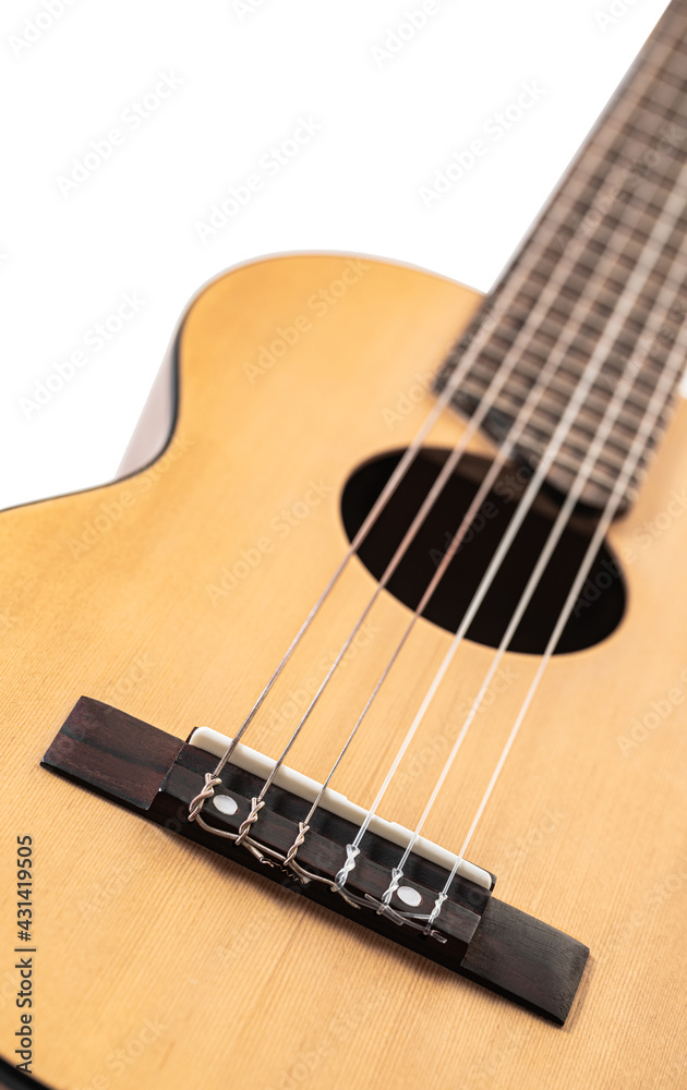 Fototapeta premium wooden guitar six-string closeup