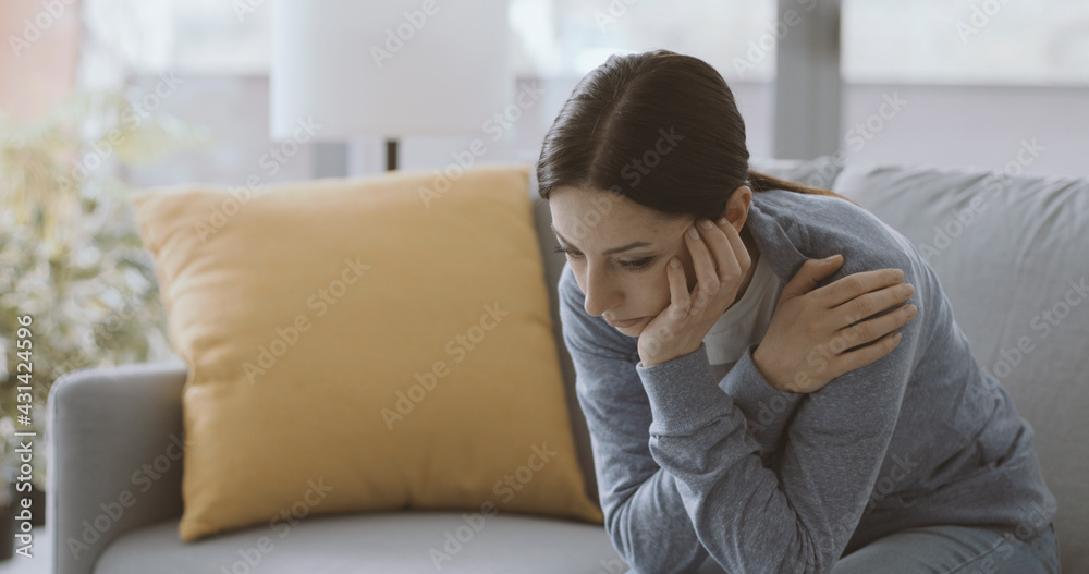 Sad depressed woman self-isolating at home Sad depressed woman self-isolating at home