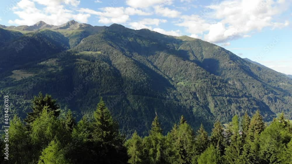 Drone shot revealing mountain and birds in the north of Italy Drone shot revealing mountain and birds in the north of Italy