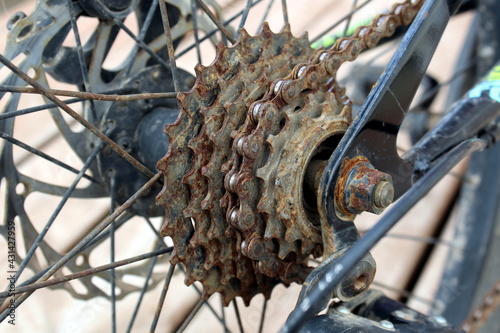 Rusty bike sprocket parts on the rear wheel