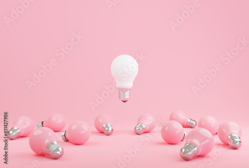Idea light bulb symbol on pink pastel background with knowledge and new ideas concept.